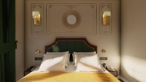 Postel nebo postele na pokoji v ubytování Hotel Ratsmühle Lüneburg