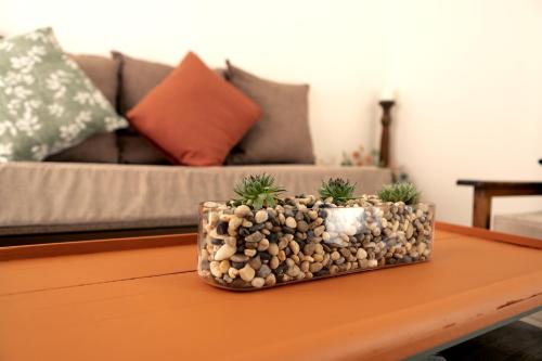 a living room with a couch and a coffee table at Klinkies in Potchefstroom