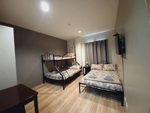 Postel nebo postele na pokoji v ubytování 2020 Travelers Inn
