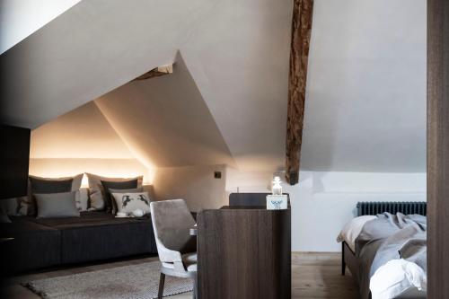 Postel nebo postele na pokoji v ubytování Hotel Ansitz Steinbock