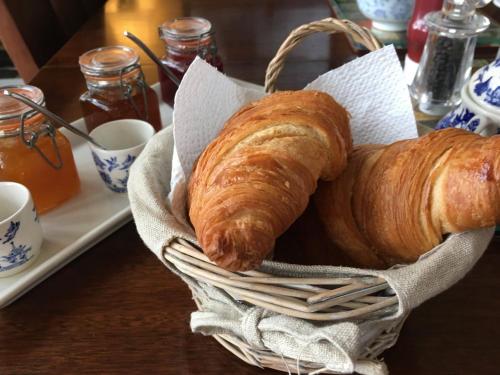 a basket with a loaf of bread on a table at BnB-side in Portland