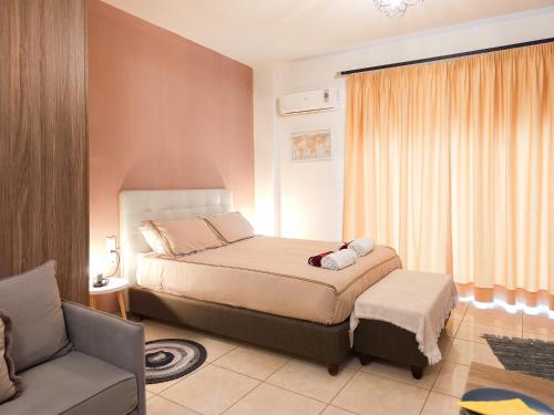 Ένα ή περισσότερα κρεβάτια σε δωμάτιο στο Bill Apartments