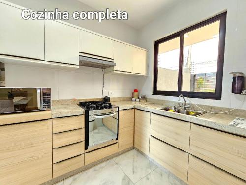 Kuchyň nebo kuchyňský kout v ubytování Casa NOVA 03 quartos prox Paraguai e Itaipu
