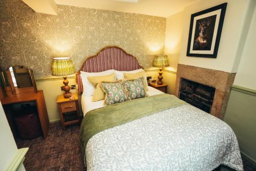 Tempat tidur dalam kamar di The Ashford Arms