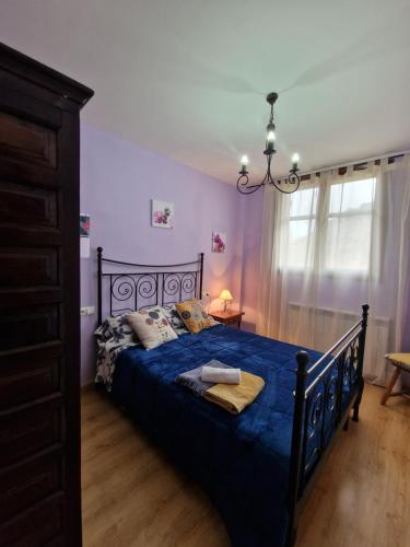 Postel nebo postele na pokoji v ubytování El Hechizo de Biescas