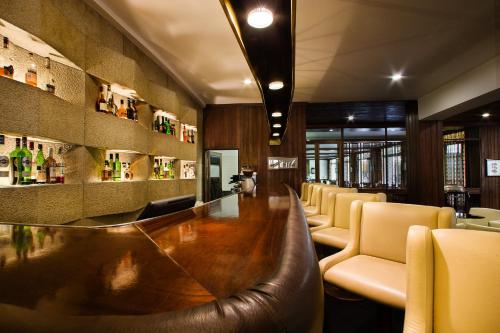 El salón o zona de bar de Grão Vasco - Historic Hotel and SPA