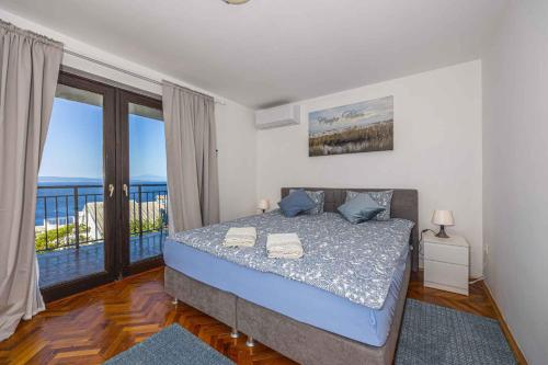 Posteľ alebo postele v izbe v ubytovaní Holiday home in Klenovica 43094