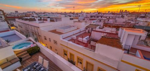 an aerial view of a city at sunset at Penthouse with Jacuzzi, and garaje Grupo AC Gestion in Cádiz