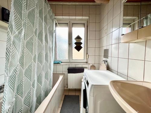Ett badrum på StayRoom Apartments I Haven im Zentrum von Linz
