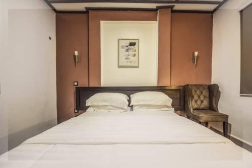 Voodi või voodid majutusasutuse VDR Hotel toas