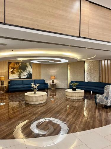 Zona de estar de Shell Residences by Amonbrey Suite nr airport