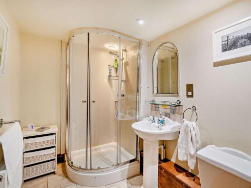 a bathroom with a shower and a sink at 6 Bed in Rye 93953 in Rye