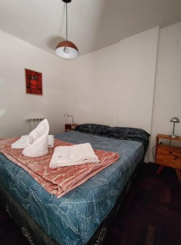 Postel nebo postele na pokoji v ubytování Paraná Terrazas Nva Cordoba