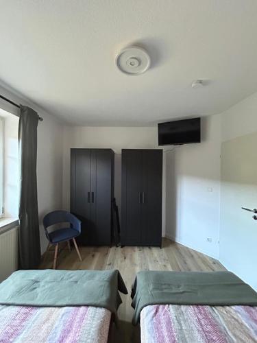 Ένα ή περισσότερα κρεβάτια σε δωμάτιο στο Quartier 21