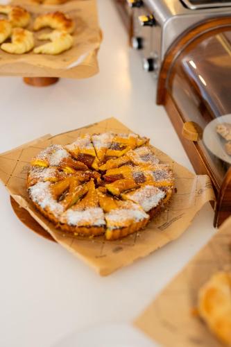 a pie sitting on a counter in a kitchen at Atlántico Boutique Hotel in Punta del Este