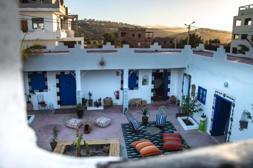 an aerial view of a white house with a patio at Riad Dar Sarah in Taghazout