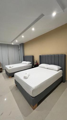 Uma cama ou camas num quarto em Hotel Gran Conquistador 33
