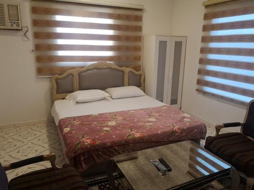 Postel nebo postele na pokoji v ubytování جوهرة سدوس Sudus Jewel