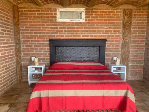 Una cama o camas en una habitación de Baja69 lodge