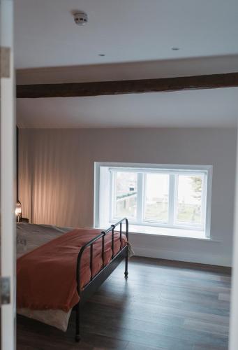 Ένα ή περισσότερα κρεβάτια σε δωμάτιο στο Apartment at 68
