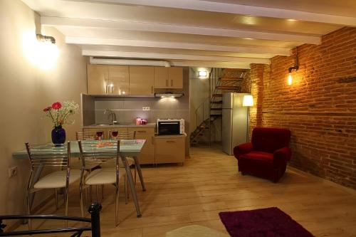 A kitchen or kitchenette at Ionia rooms