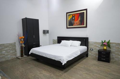 Katil atau katil-katil dalam bilik di Club Rey Pez Espinal