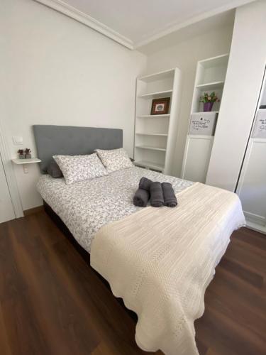 Cama ou camas em um quarto em Apartamento Oviedo Centro