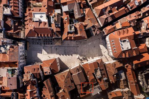 an aerial view of a city with red roofs at Duplex with terrace in the city centar in Split