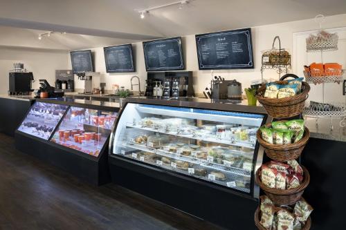 a bakery with a display case with food in it at La Casa Del Zorro Resort & Spa in Borrego Springs