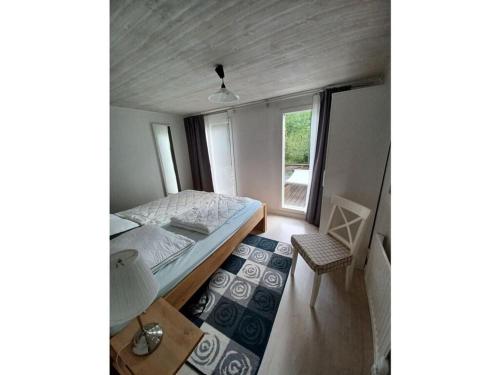 Voodi või voodid majutusasutuse Pleasant apartment in Bjurvik toas