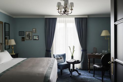 Postel nebo postele na pokoji v ubytování Hotel Rotary Geneva - MGallery
