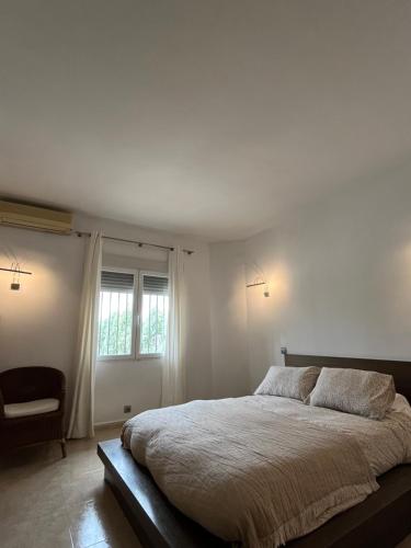 Postel nebo postele na pokoji v ubytování Casa Galiana.