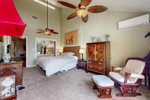 a bedroom with a bed and a ceiling fan at Buena Vida 17 in Navarre