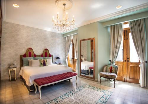 Postel nebo postele na pokoji v ubytování La Concordia - Boutique Hotel