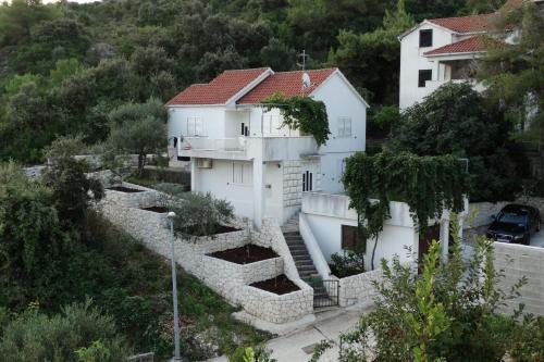 Apartments with a parking space Postira, Brac - 22664