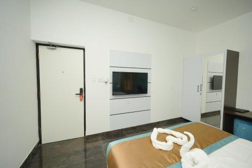 Postel nebo postele na pokoji v ubytování Bay Breeze Suites