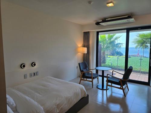 Postel nebo postele na pokoji v ubytování Lareem Boutique Hotel
