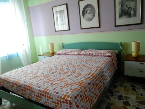 Un ou plusieurs lits dans un hébergement de l'établissement I Tetti Di Sassari B&B