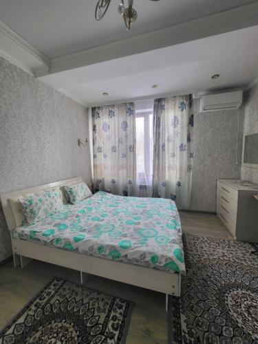 En eller flere senge i et værelse på Light Apartment