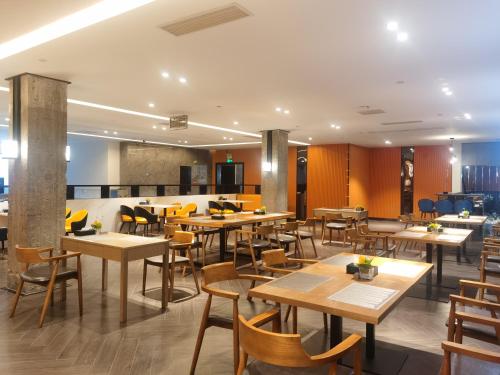 Restoranas ar kita vieta pavalgyti apgyvendinimo įstaigoje Paco Hotel Guangzhou North Railway Station