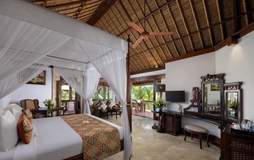 Postel nebo postele na pokoji v ubytování Kori Ubud Resort, Restaurant & Spa