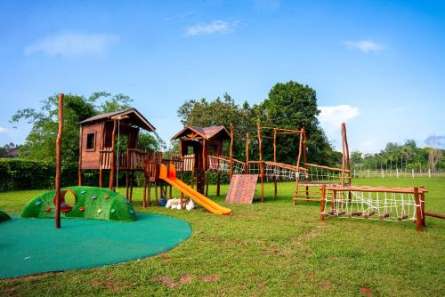 a park with a playground with a slide and play equipment at Aston Serang Hotel & Convention Center in Serang