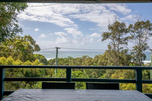 a view of the ocean from the porch of a house at Captain's Cove at Cylinder Beach in Point Lookout