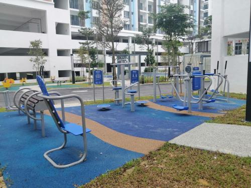 a playground in a city with a blue at Bayu Temiang - 5pax Quiet Home in Seremban