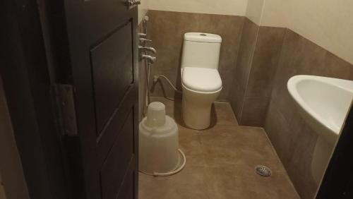 Koupelna v ubytování HOTEL SAMUDRA