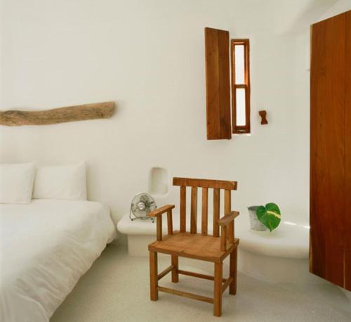 Postel nebo postele na pokoji v ubytování Hotel Azucar, Monte Gordo, a Member of Design Hotels