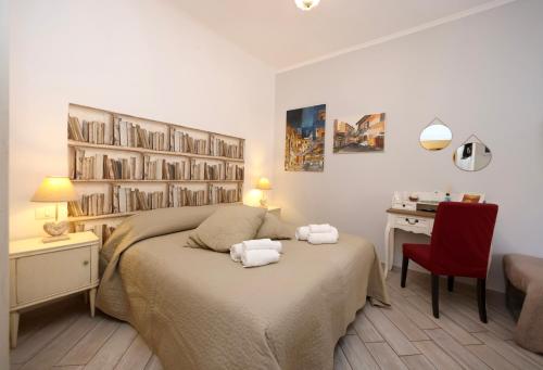 A bed or beds in a room at Sivory Rome