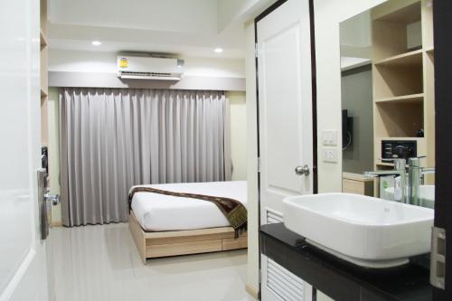 Phòng tắm tại La Porte Hotel Bangkok