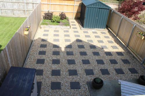 an aerial view of a backyard patio with a checkerboard pattern at Cosy Holidayhomes Kerry in Kenmare