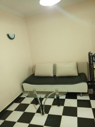Tempat tidur dalam kamar di Апартамент Първанова